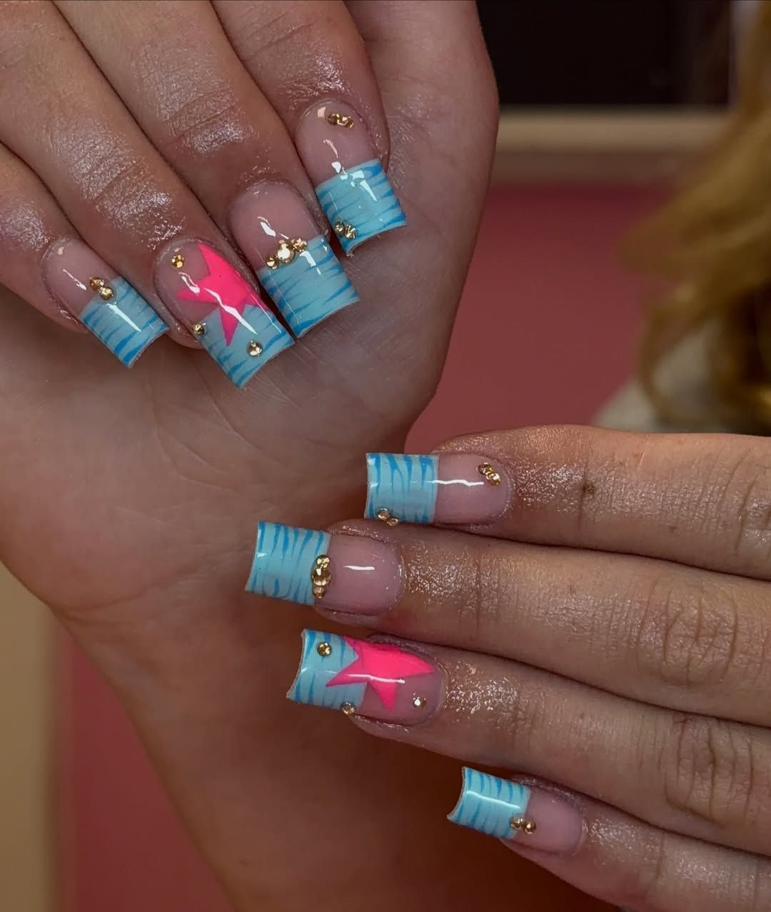 Sky blue zebra tips with hot pink stars