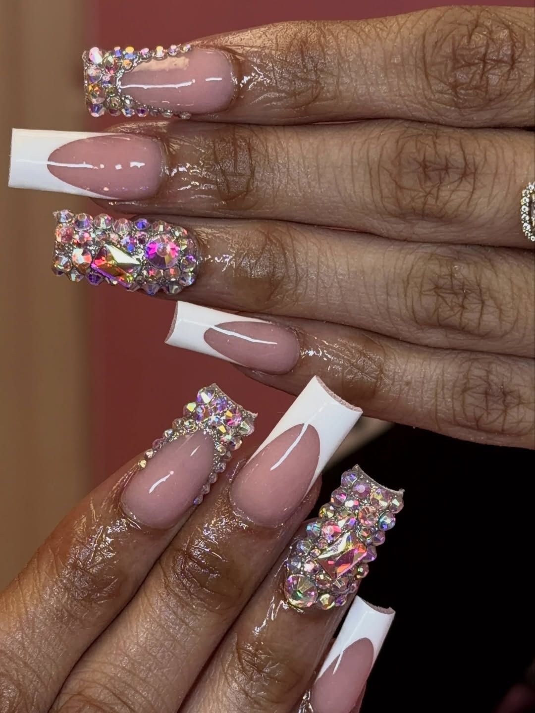 Nude set with white French tips and rhinestone accent nails